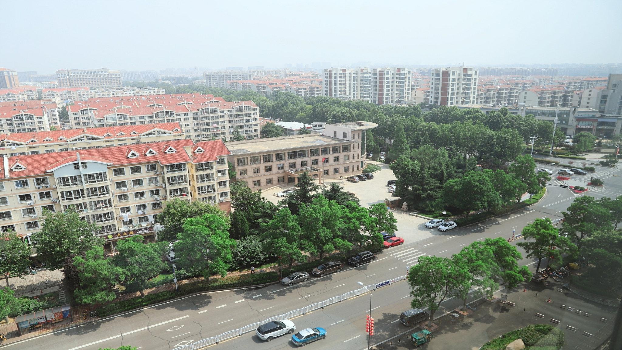 Qingdao Parkview Holiday Hotel ภายนอก รูปภาพ